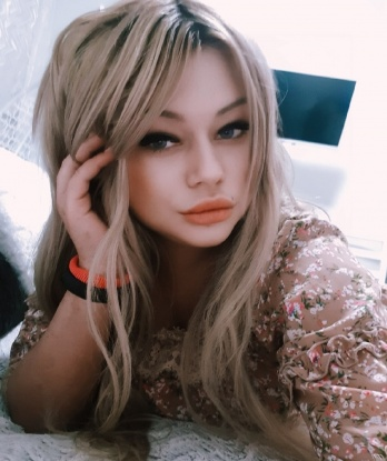 Мила